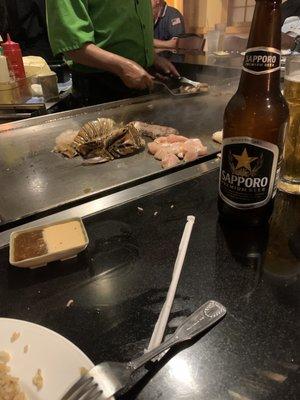 Seafood and chicken and Sapporo