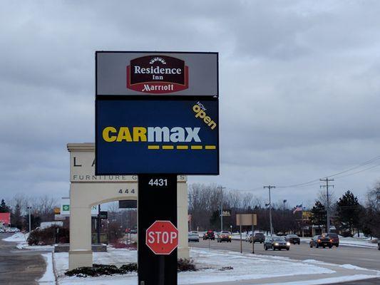 The hotel shares signage with a neighboring business. This is their sign as seen from the highway.