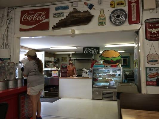 The grill and cooks area by side door.