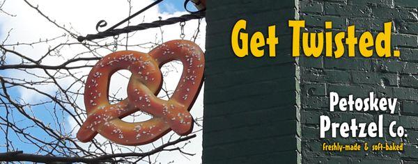 Pretzel hanging outside the shop, pointed both towards Lake Michigan and down Petoskey Street.