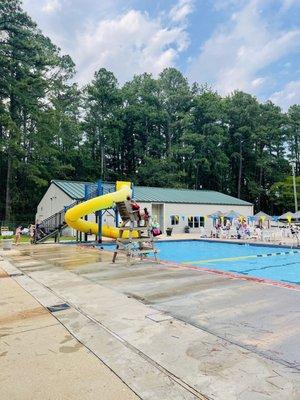 Slide, deck and pool