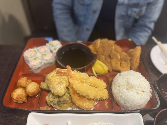 Chicken Katsu bento box, tempura shrimp and California roll.