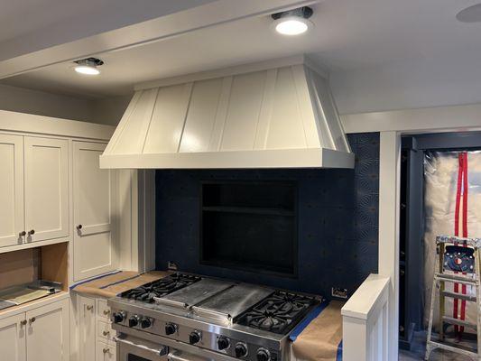 Kitchen cabinets, refinished, and overhead fan