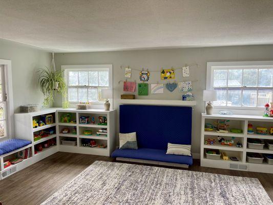 Inside play area for independent learning with toys, socializing with others, and having fun!