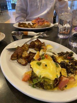 Black bean burger Benedict special with roasted potatoes