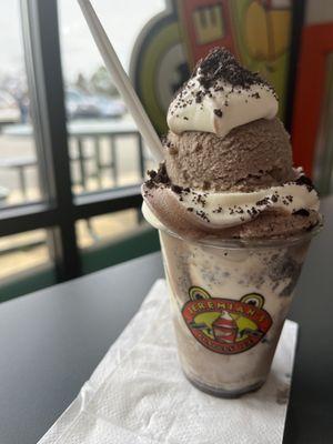 Oreo mud pie gelati (cookies and cream Italian ice, vanilla and chocolate swirl soft serve, crumbled Oreo pieces)