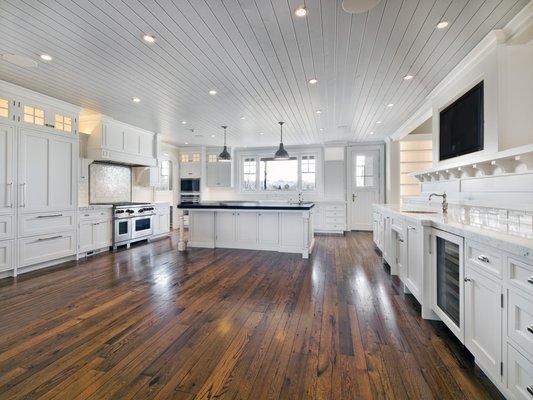 This contemporary kitchen used our reclaimed oak flooring and it looks stunning!