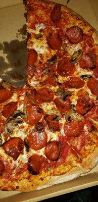 Pepperoni, mushroom and bacon.. where's the toppings?