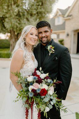 Gorgeous bride with her bridal bouquet along with groom and his boutonniere