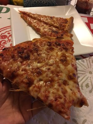 Tried my first delivery simple large cheese pizza DELICIOUS! Sweet and tangy. Crispy crust too!