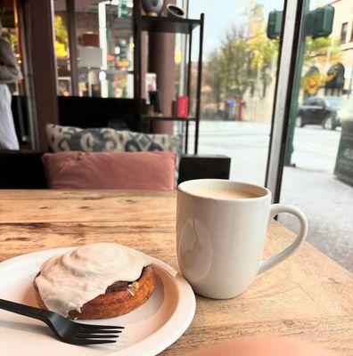 Tea latte and cinnamon roll