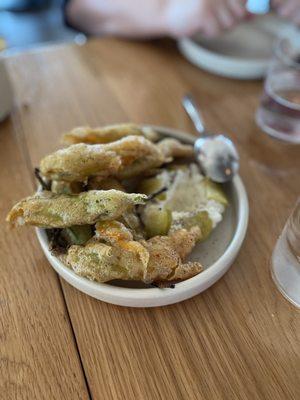 Tempura squash blossoms, yuzu goat cheese, tomatillo, pine-agave syrup ($18)