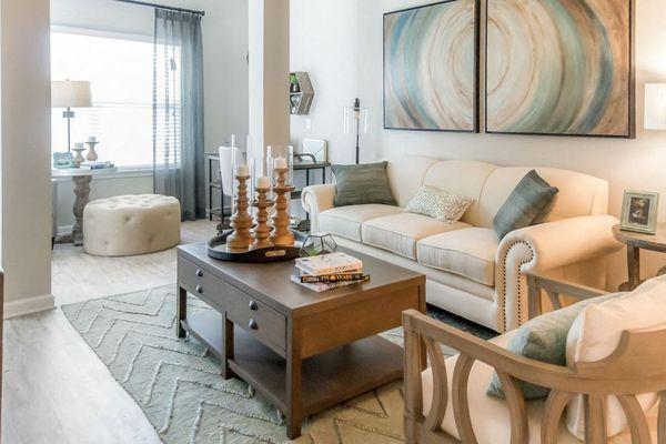 a living room with a couch and a table at Sterling Creek