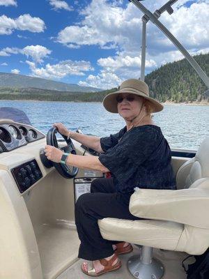 My wife at the wheel on Lake Dillon