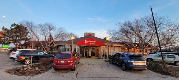 Welcome! The red canopy floats overhead as to reflect the blessings on those who enter the Birchwood Grill.