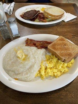 Two eggs, grits, and bacon platter