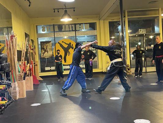 Sifu teaching self defense techniques from their Northern Shaolin  Eagle Claw Kung-fu system.