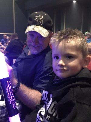 My dad, my son and his $15/2 wand.  Wand is a light up pool noodle that will end up in the trash!