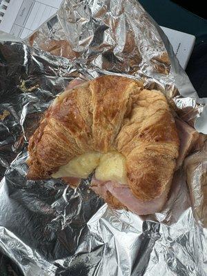 Ham, egg and cheese on a croissant