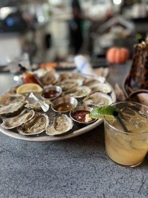 Happy hour oysters and house mule