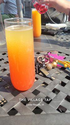 Pineapple mimosa with grenadine