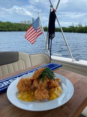 Coconut crusted shrimp with fresh mango chutney.