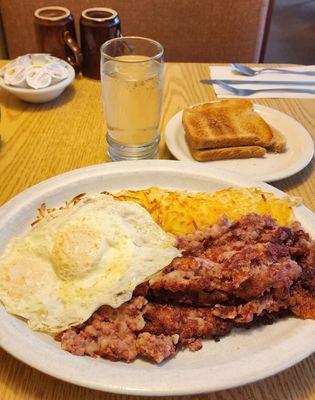 Corned Beef Hash w/pair overeasy eggs, hash browns, and whole wheat toast ($16.95, 9/27/23)