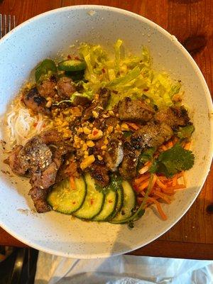 Saigon bowl, pork, salad, cucumbers, carrots Asian noodles and a wonderful sauce.