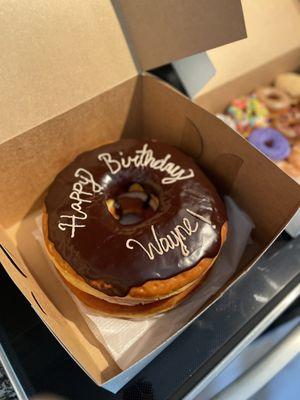 My special order chocolate frosted chocolate cream filled donut cake!