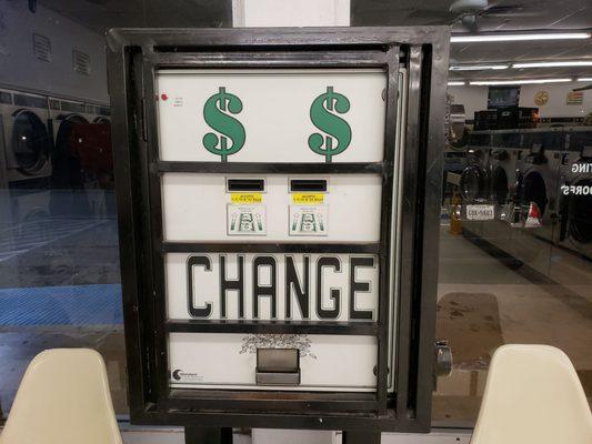 The change machine. Washers and dryers only take quarters.