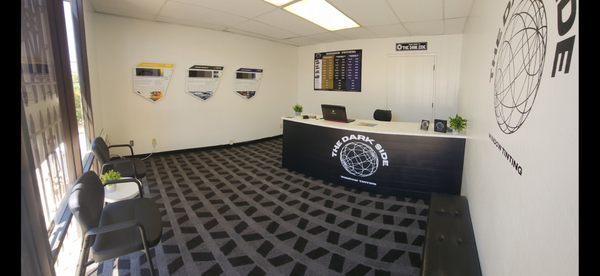 Clean air conditioned showroom and waiting area. On the back wall is our price board covering most vehicles to help ensure fair pricing.