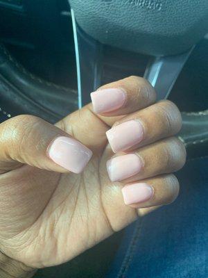 Nails with terrible polish job, nails do not look natural