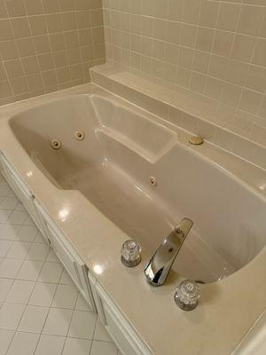 BEFORE: Outdated and useless old jet tub