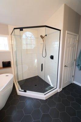 Corner Shower with header and black hardware.