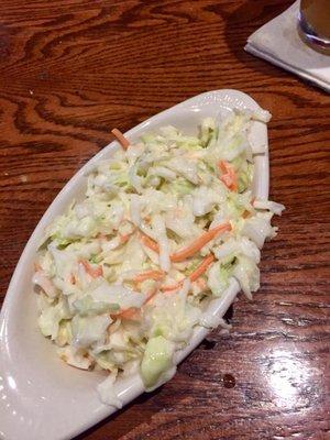 Coleslaw. Good portion but bland in taste.