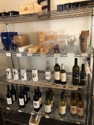 Merch and wine shelf