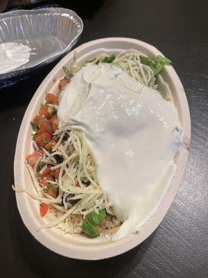 Burrito bowl w/ sour cream.