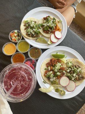 Asada and Al pastor tacos with Jamaica agua Fresca