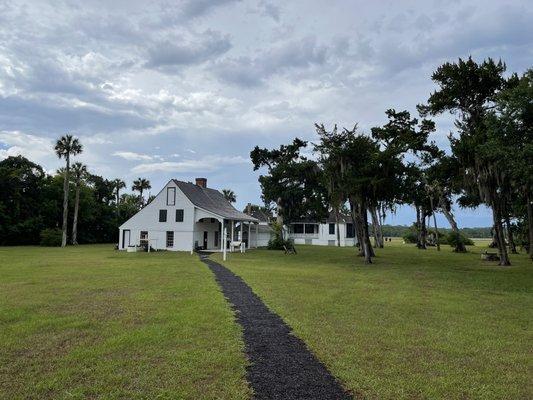 Approach to the kitchen and Mrs. Kingsley's home and the main house (in the background)