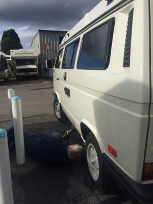 Filling our propane tank requires getting down and dirty!