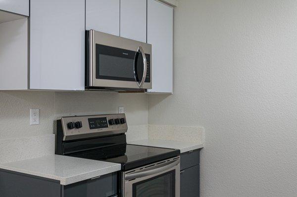 Stainless Steel Appliances & quartz counters at Crestwood Apartment homes