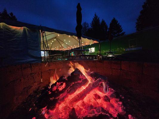 Campfire, tent seating, food truck