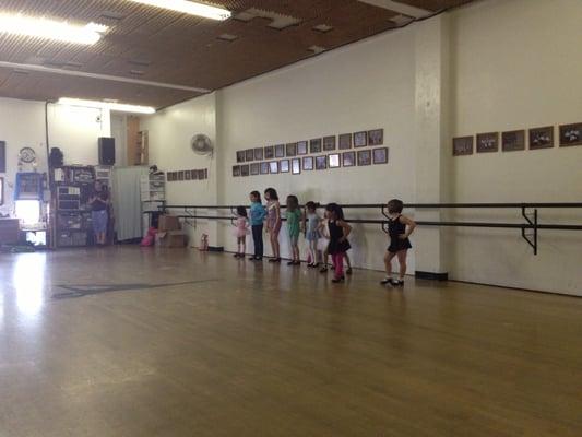 View of main studio during beginner's jazz & tap class.