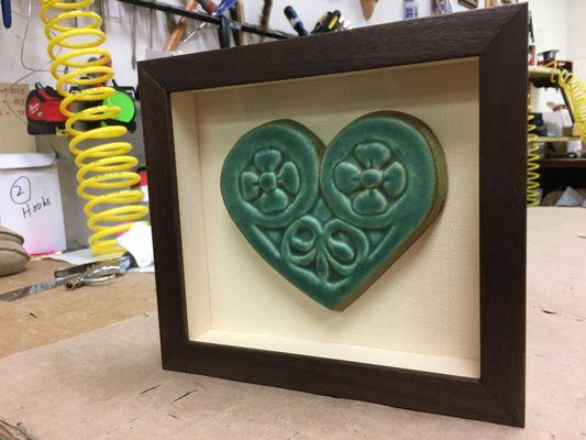 Stone heart in a shadow box