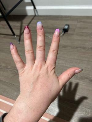 Full set, short coffin, french tip with shapes of pinks and purples.