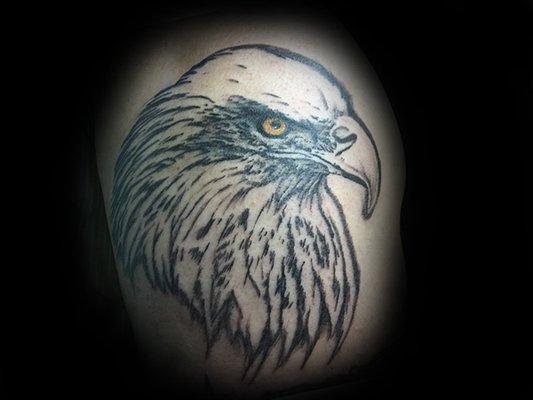 Eagle on upper Arm (is covering a small eagle head, can you find it)?