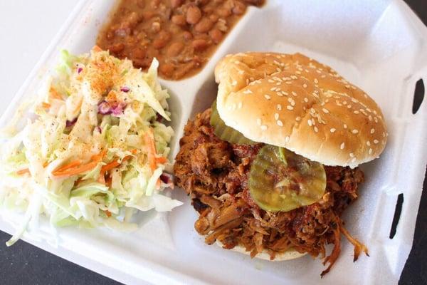 Pulled Pork Sandwich w/ Cole Slaw and Beans.