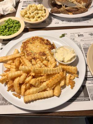 Crab cake with fries. Clearly the crab cake was not cooked evenly.