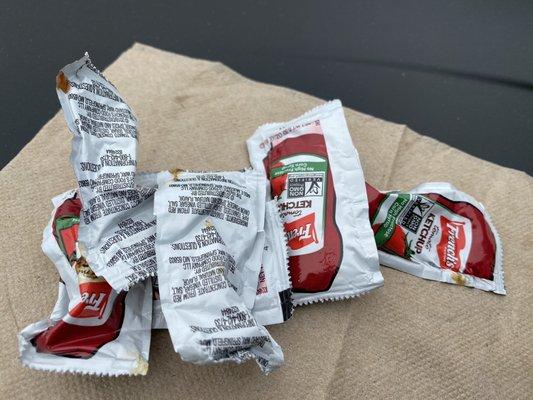 The ketchup packets thrown in our bag were covered in a nasty, yellow, sticky substance. So gross.