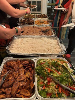 Sweet plantains, Curry goat, jerk chicken, rice with peas, sweet chili Shrimp, oxtail